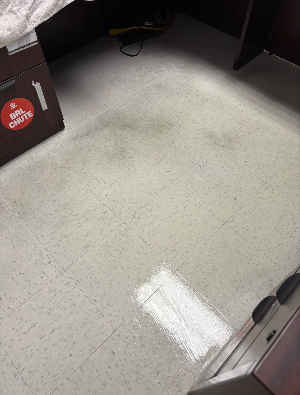 Mailroom tile floor after cleaning, bright and clean